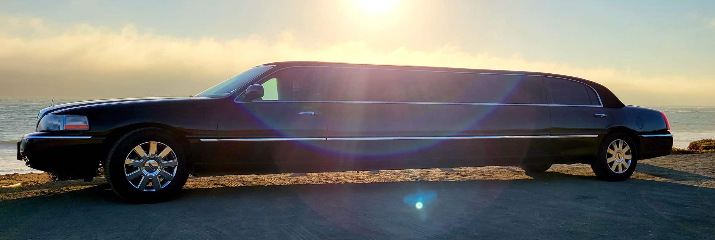 stretch limousine at sunset